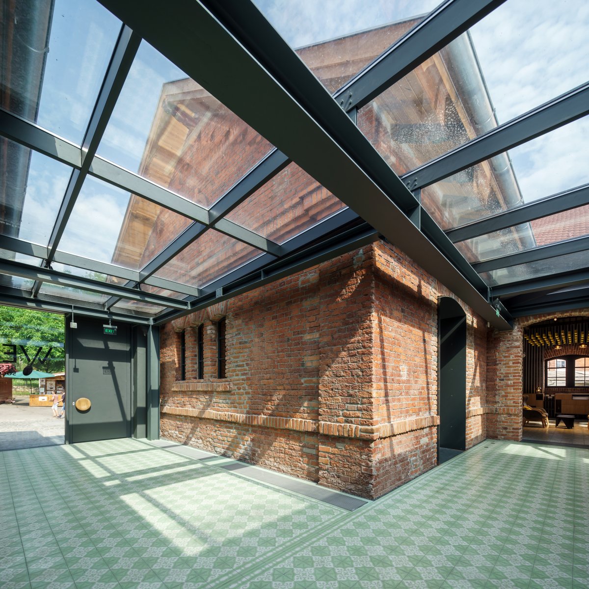 entrance hallway. glass roof let you see the entire existing building from inside